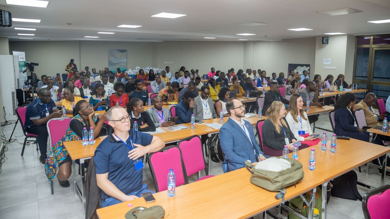 Workshop delegates seated in rows during a plenary session at the COTC Africa training workshop